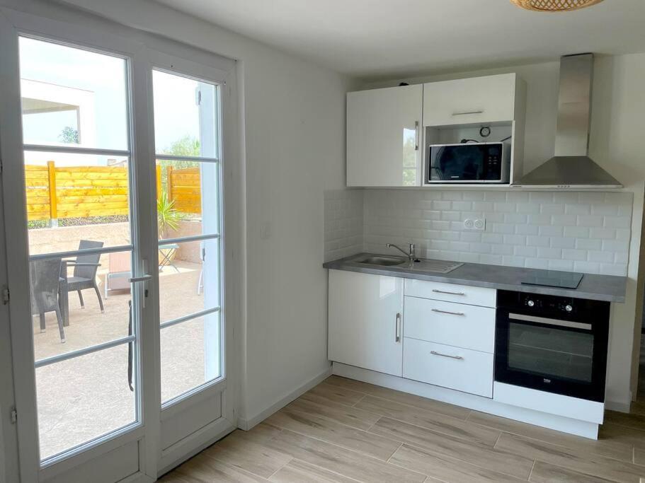 Charmant Appartement, T2 50M2, A Biguglia Buitenkant foto